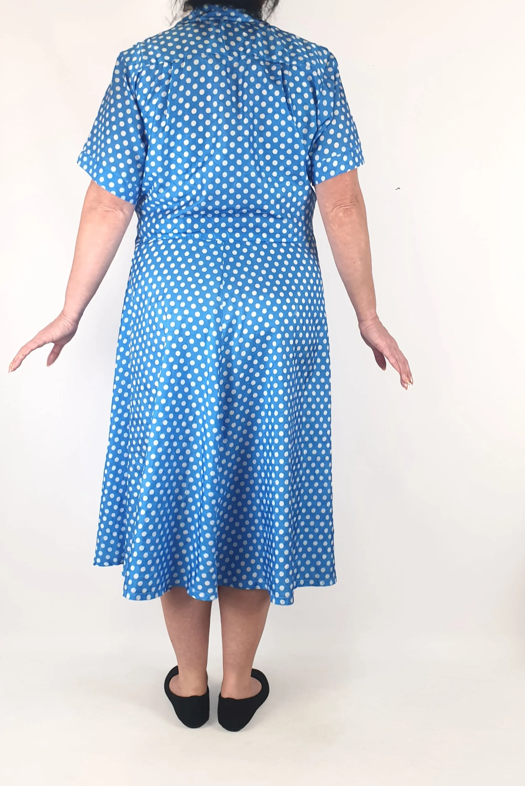 Blue polka dot dress fits size 16-18