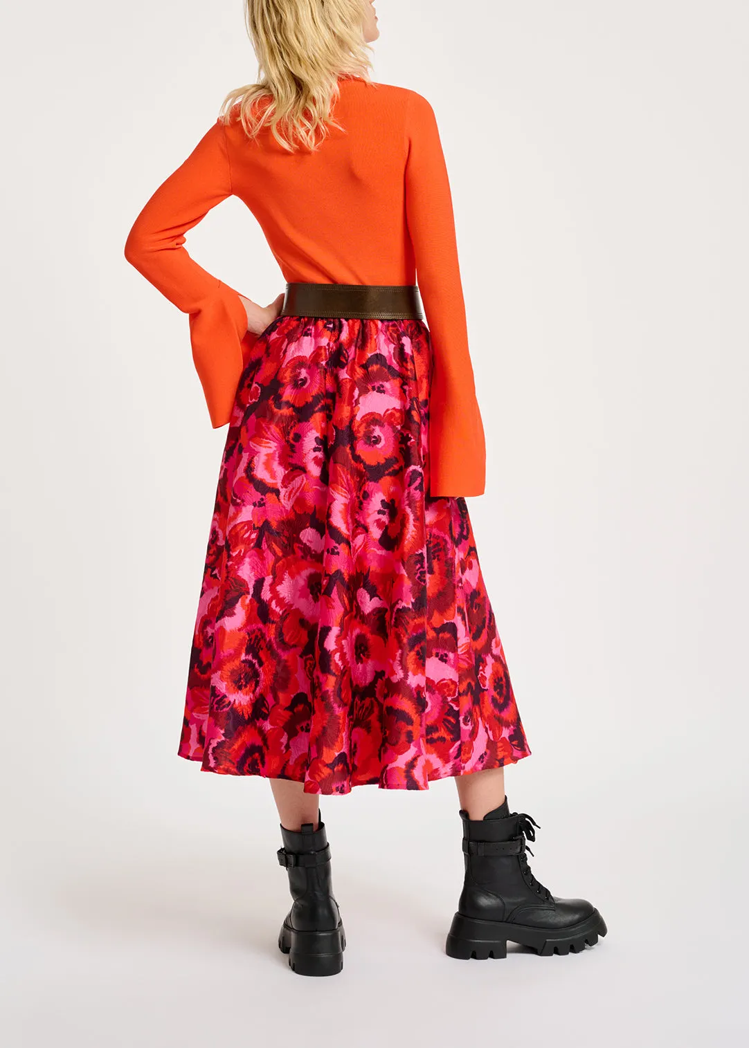 Orange slim-fit knit sweater with trumpet sleeves