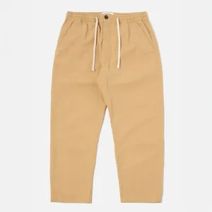 UNIVERSAL WORKS Hi Water Trousers in Dark Sand