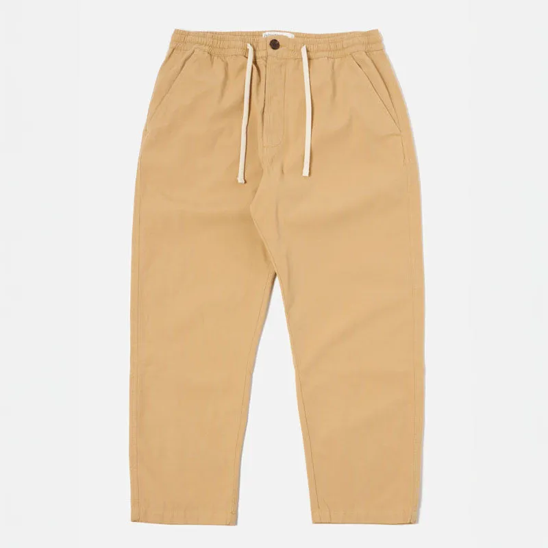 UNIVERSAL WORKS Hi Water Trousers in Dark Sand